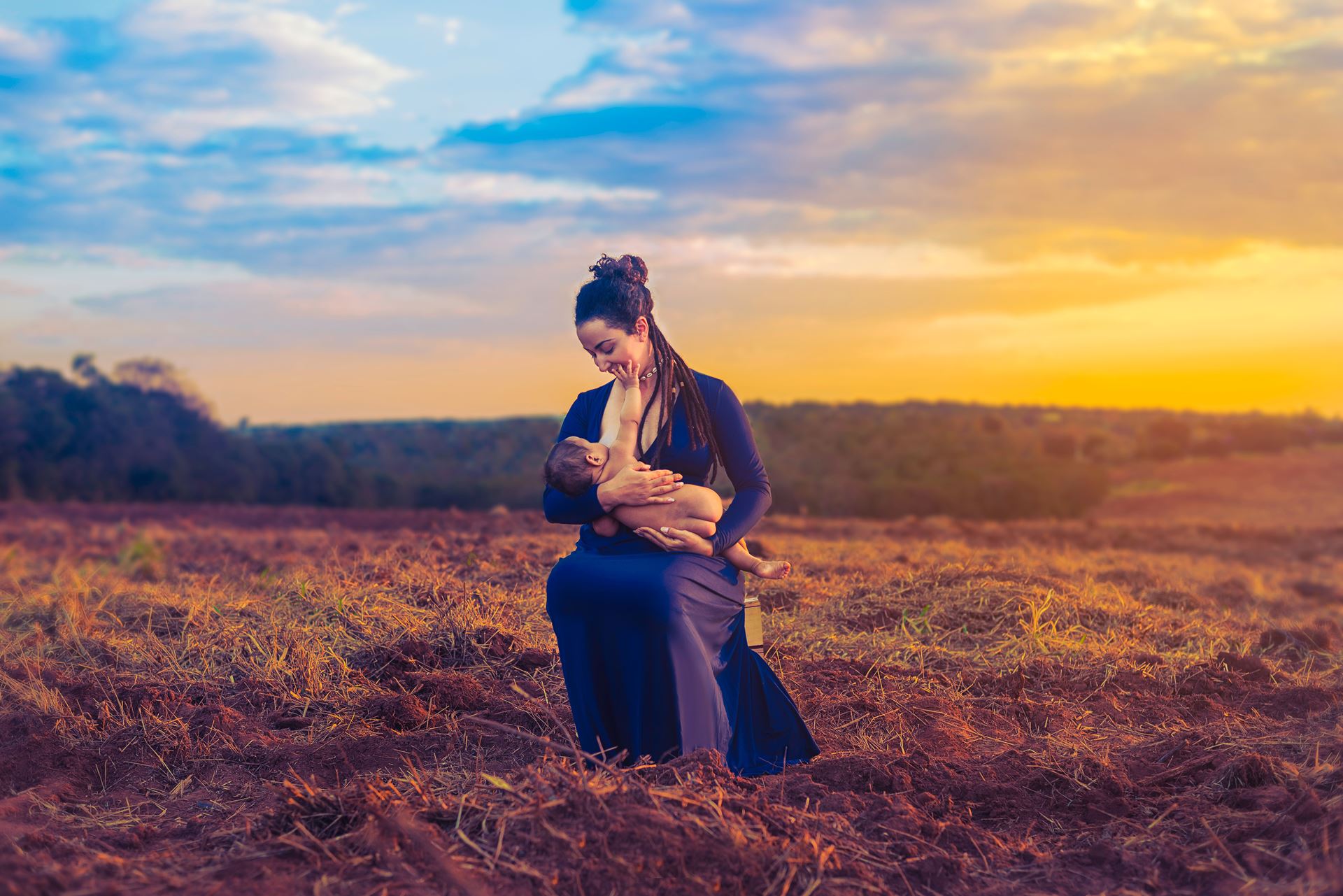 breastfeeding in a field